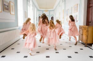Hintlesham Hall Wedding Suffolk flower girls having fun running